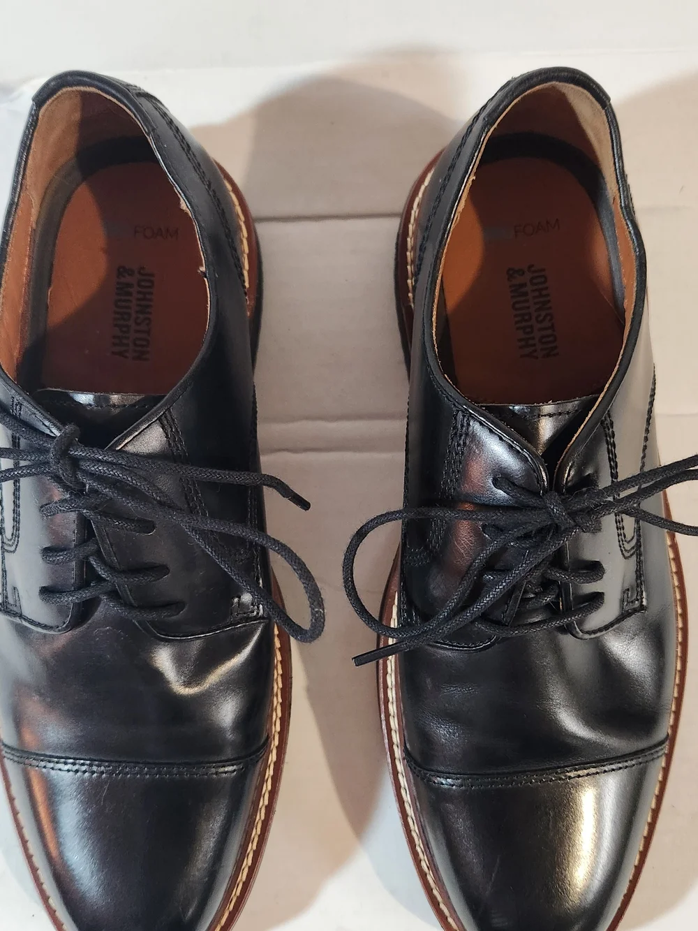 Johnston & Murphy Black Leather Cap-Toe Derby with Brown Welt